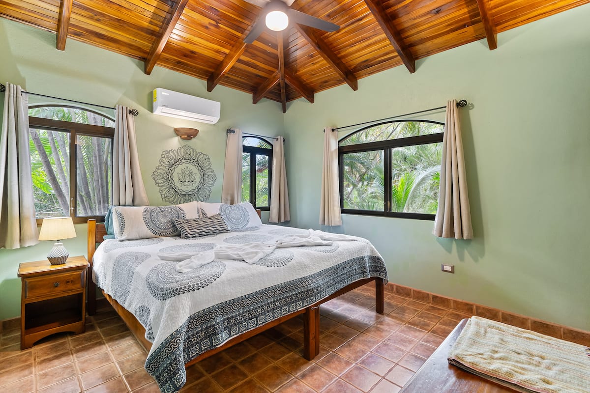 Bedroom of the Sirena Suite, a one-bedroom jungle villa